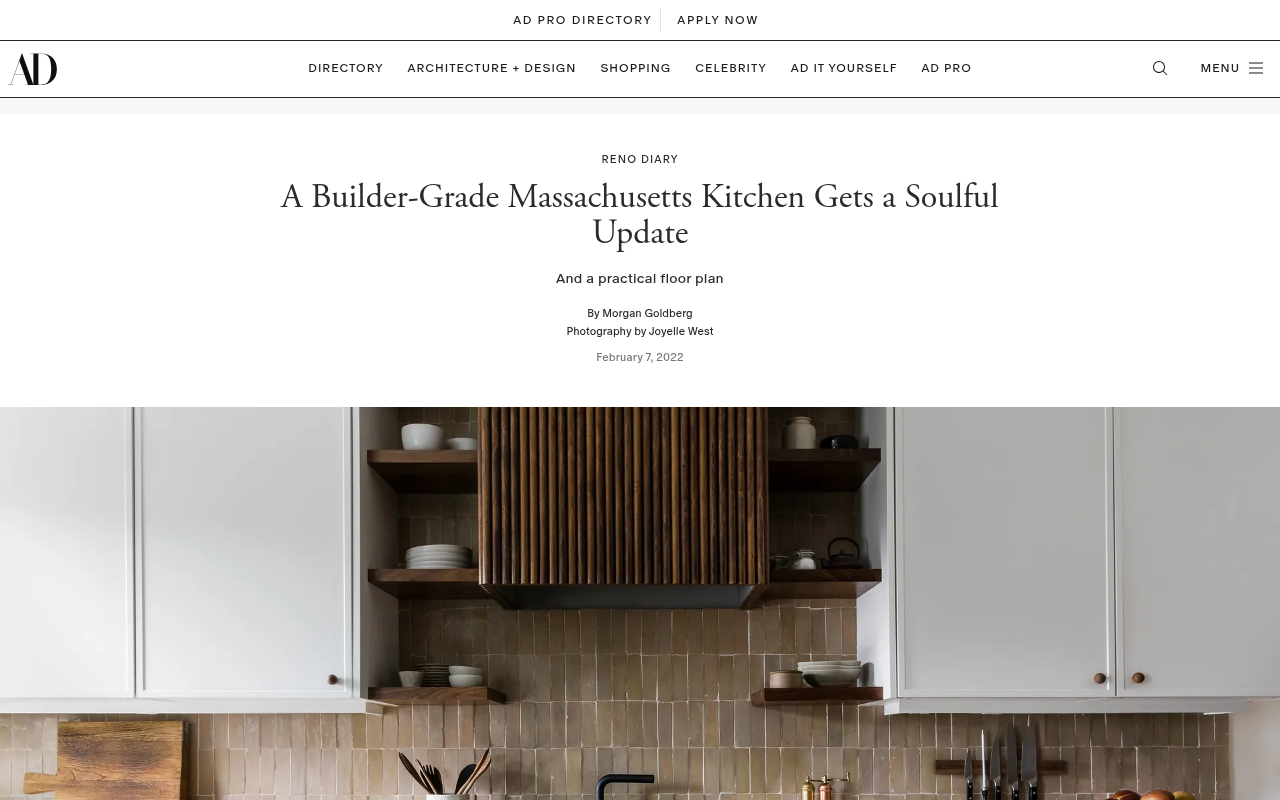 Architectural Digest's profile of the Brookline condo kitchen showing reused IKEA cabinet boxes, Zellige backsplash, and the new dining layout after peninsula removal.